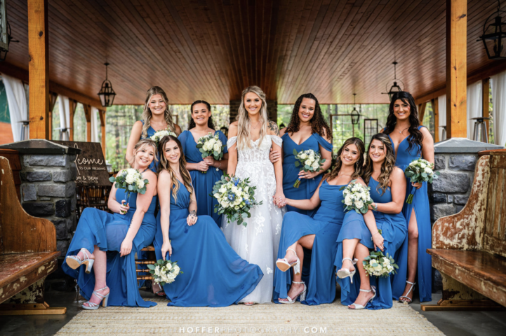Bridal party posed in Pavilion entryway.